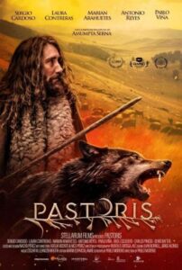 Cartel de la película con un paisaje rural y un pastor con ovejas.